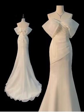 Elegant Off-Shoulder White Evening Gown with Bow Detail